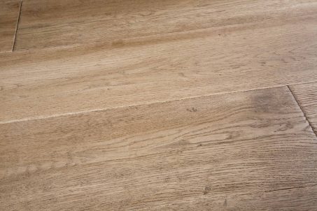 Light Brown and grey engineered wood flooring of handscraped rustic distressed oak 240mm wide similar to a reclaimed board with natural oil finish in Surrey