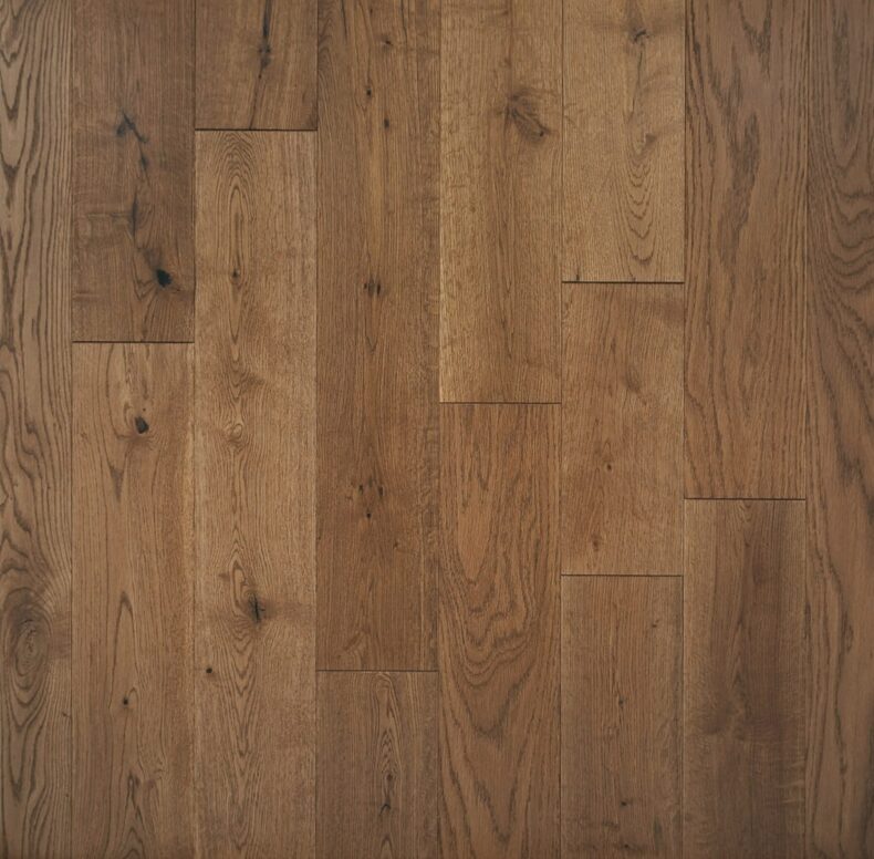 Engineered wood flooring oak rustic grade 125mm wide with smooth surface finished with lacquer in Surrey