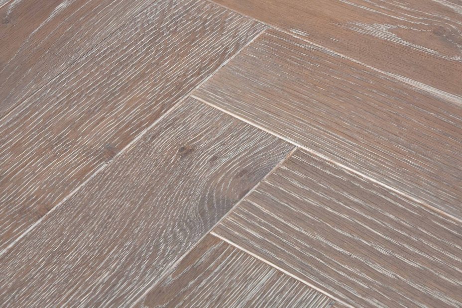 Grey brown engineered wood flooring oak parquet herringbone with brushed surface finished with white oil in Surrey