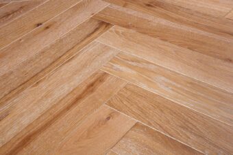 Bespoke light brown and light grey Herringbone engineered parquet wood flooring