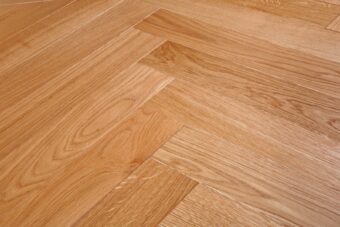 Bespoke brown and light brown Herringbone engineered parquet wood flooring