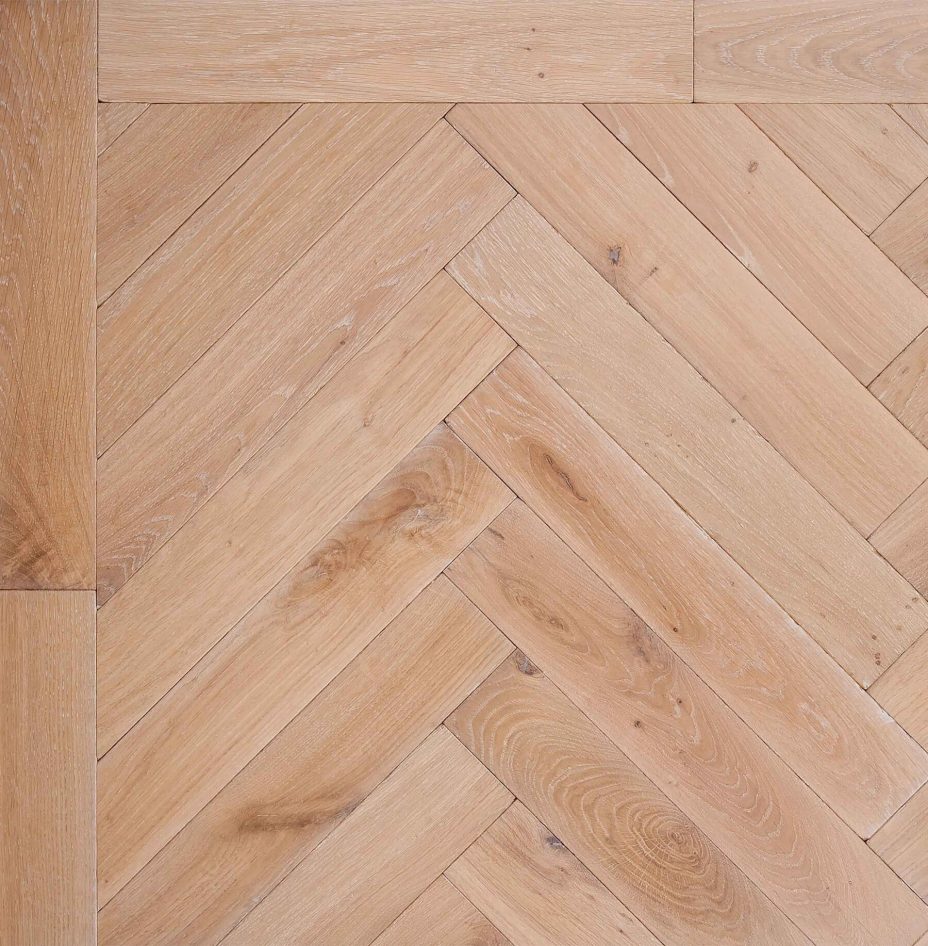Bespoke light brown and grey Herringbone engineered parquet wood flooring