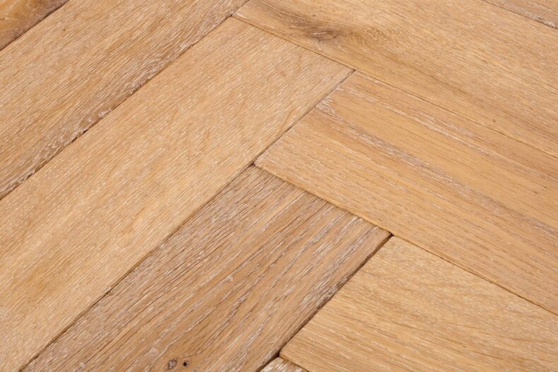 Bespoke brown and grey Herringbone engineered parquet wood flooring