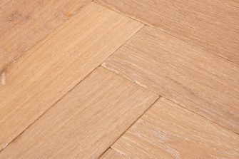 Bespoke light brown and white Herringbone engineered parquet wood flooring