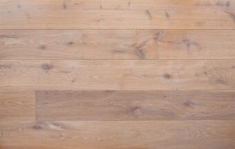 Bespoke light brown and light grey engineered wood flooring in multi-width planks