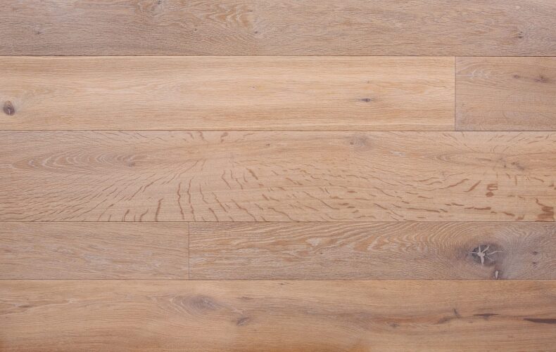 Bespoke light brown and grey engineered wood flooring in multi-width planks
