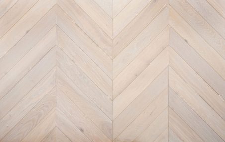 Bespoke light grey and white chevron engineered parquet wood flooring