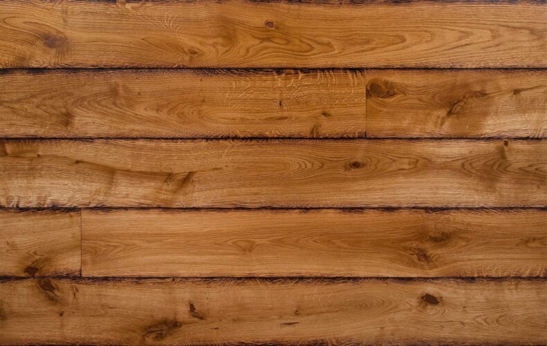 Bespoke brown and dark brown engineered wood flooring in multi-width planks