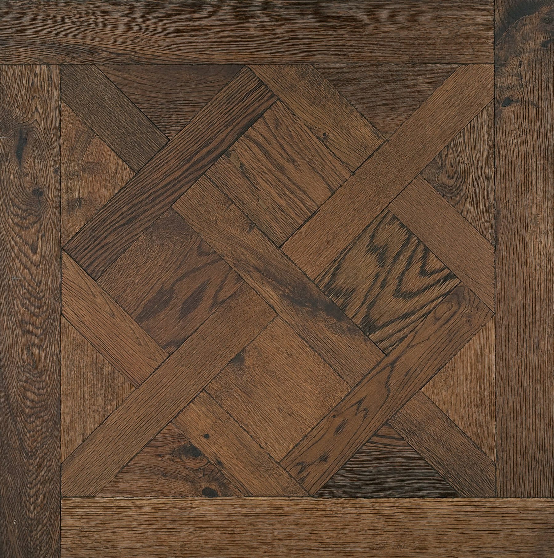 Dark brown Versailles panel engineered oak wood flooring vintage grade heavily brushed finished with natural oil in Surrey