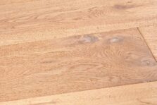 Distressed light brown engineered oak wood flooring country grade 190mm wide with splits and character finished with natural oil in Surrey