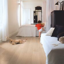 View of White Varnished Oak IM3105 laminate tile by Quick-Step