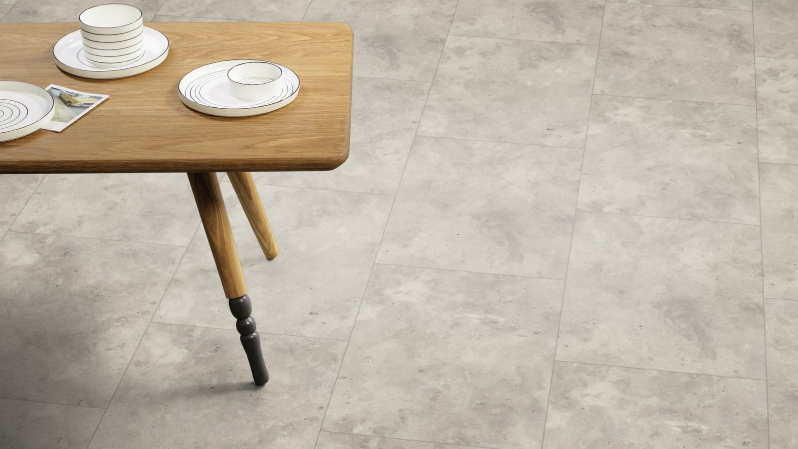 The Broken Bond design of Worn Concrete luxury vinyl tile by Amtico