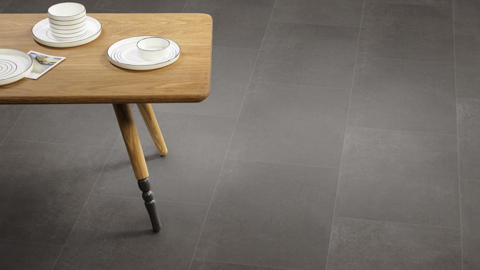The Broken Bond design of Diffusion Charcoal luxury vinyl tile by Amtico