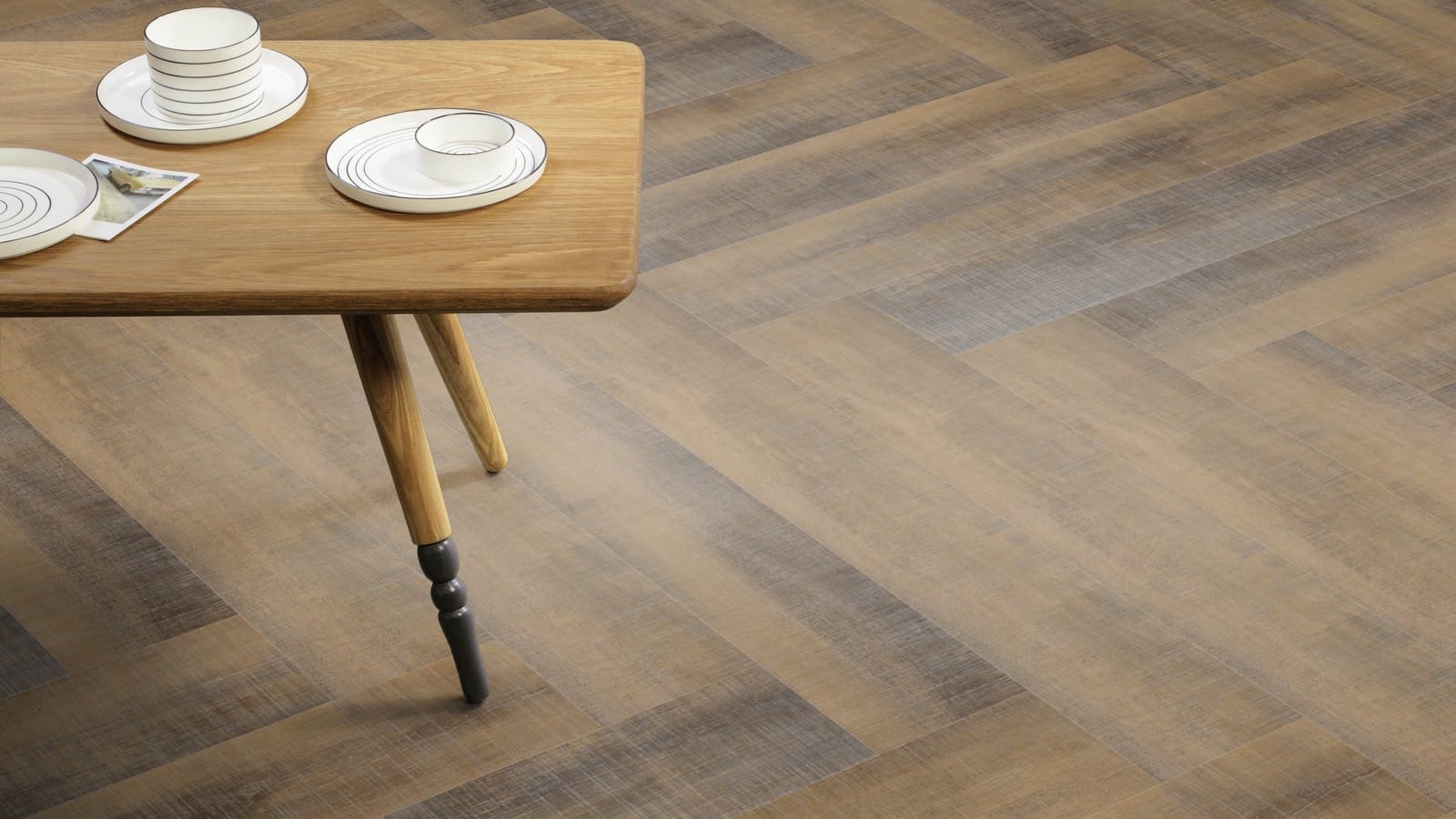 The Herringbone Plank design of Union Oak luxury vinyl tile by Amtico