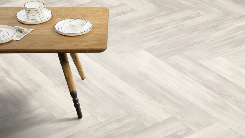 The Herringbone Plank design of Solar Pine luxury vinyl tile by Amtico