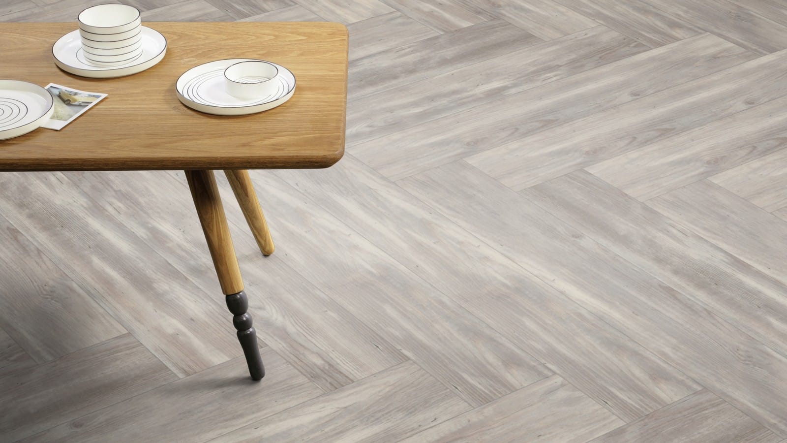 The Herringbone Plank design of Halo Pine luxury vinyl tile by Amtico