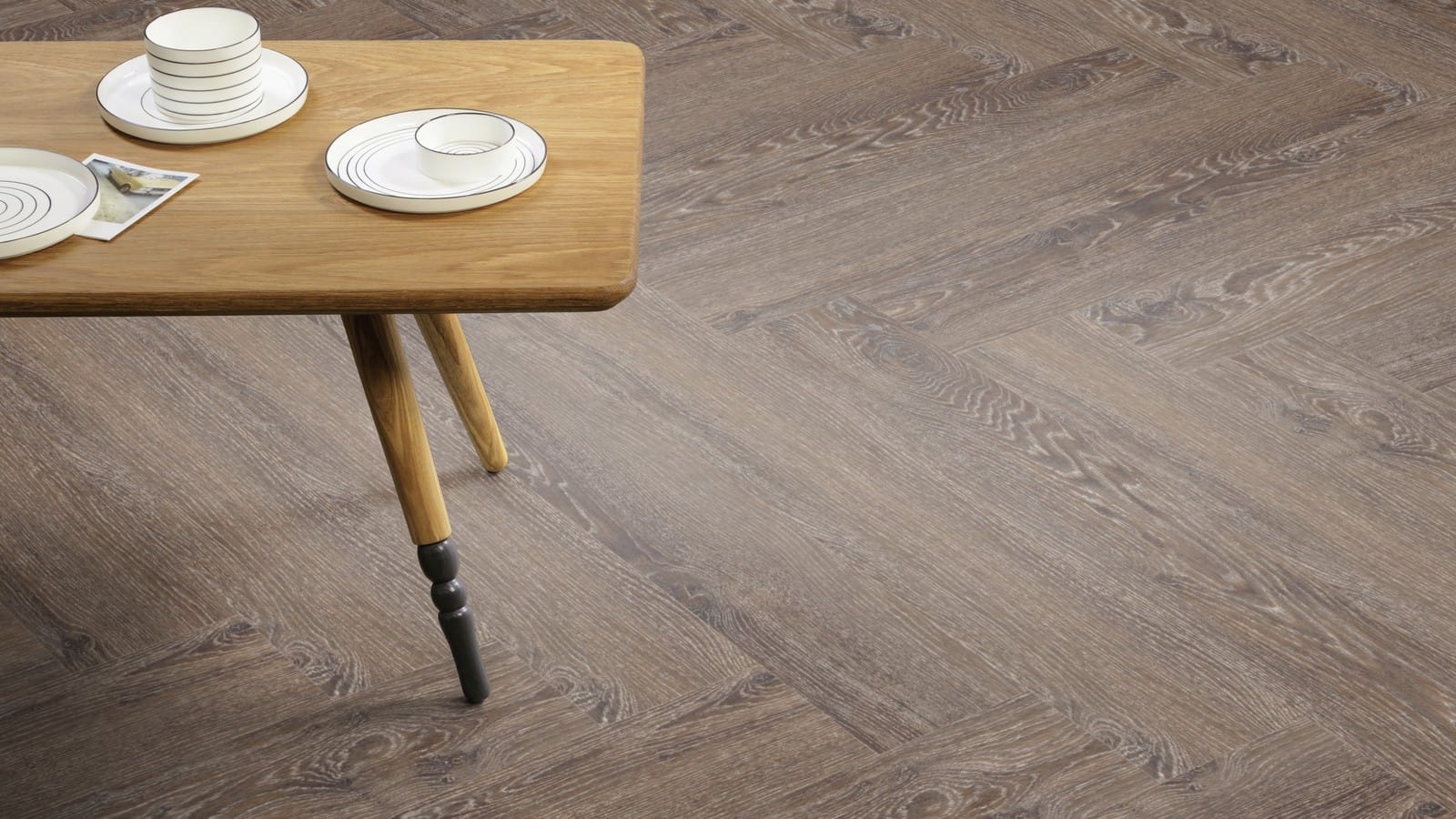 The Herringbone Plank design of Pilgrim Oak luxury vinyl tile by Amtico