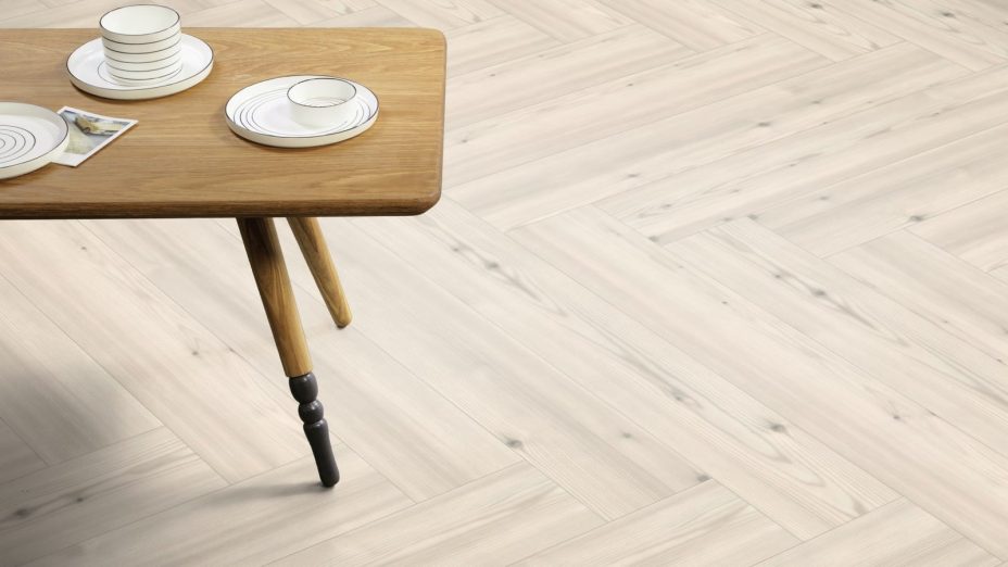The Herringbone Plank design of Chalked Pine luxury vinyl tile by Amtico
