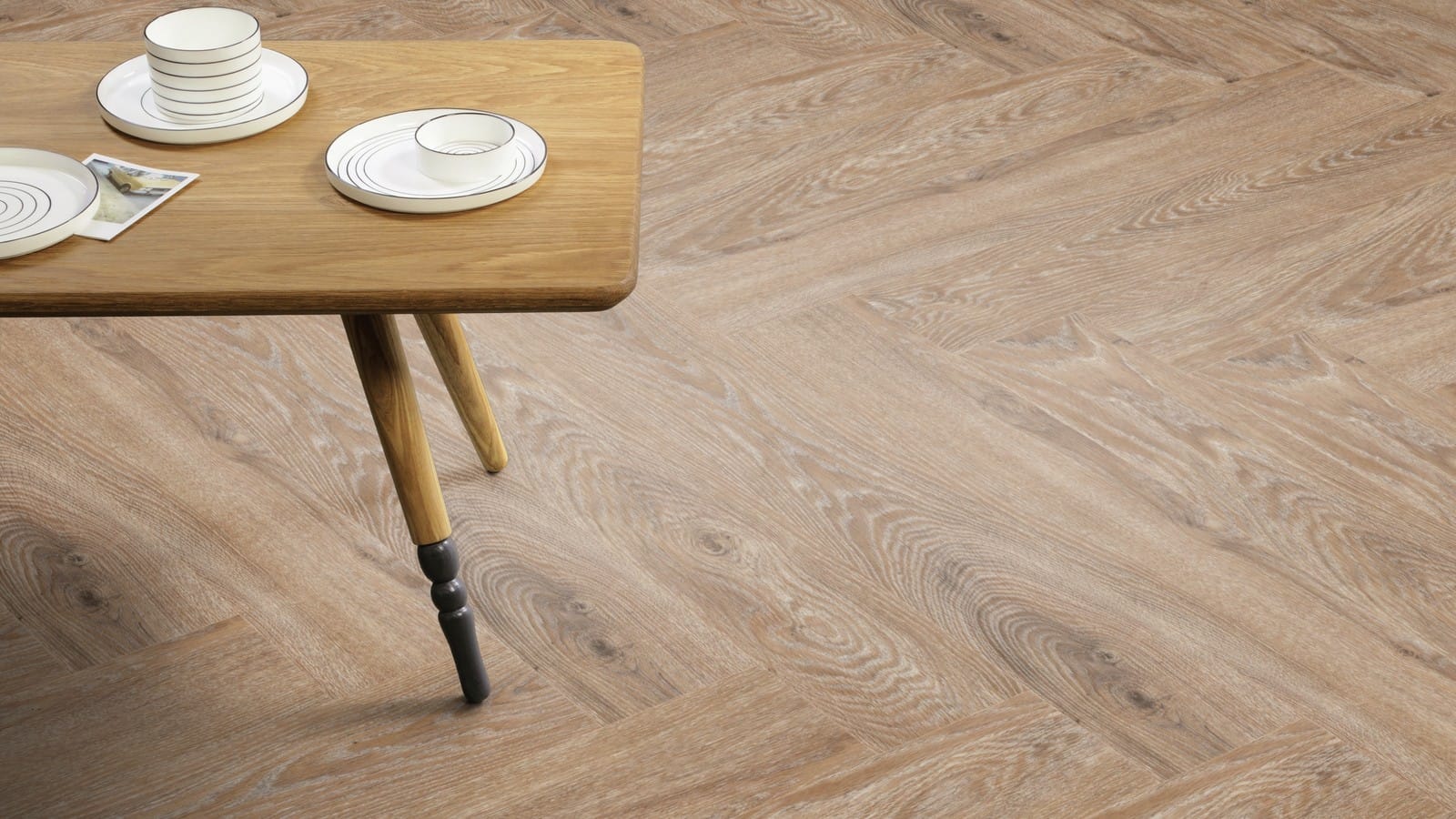 The Herringbone Plank design of Salted Oak luxury vinyl tile by Amtico