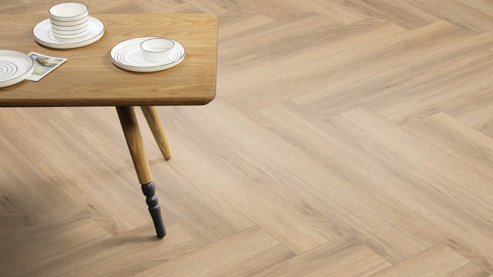 The Herringbone Plank design of Cornish Oak luxury vinyl tile by Amtico