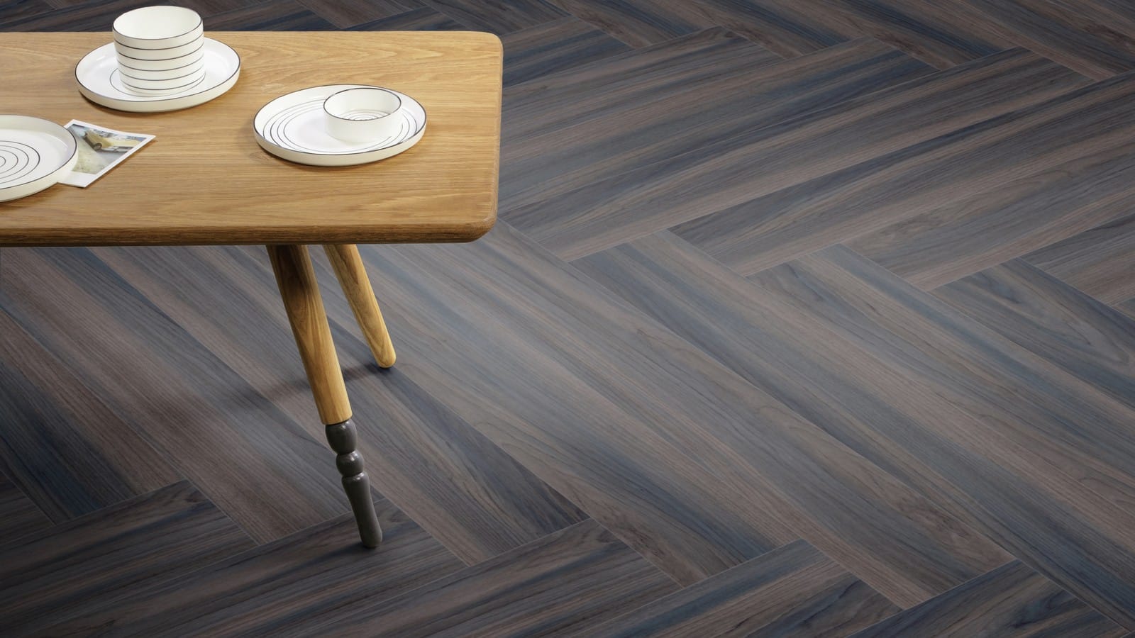 The Herringbone Plank design of Ink Wash Wood luxury vinyl tile by Amtico
