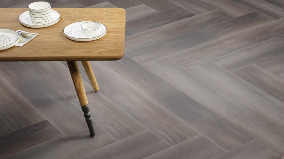 The Herringbone Plank design of Aurora Grain luxury vinyl tile by Amtico
