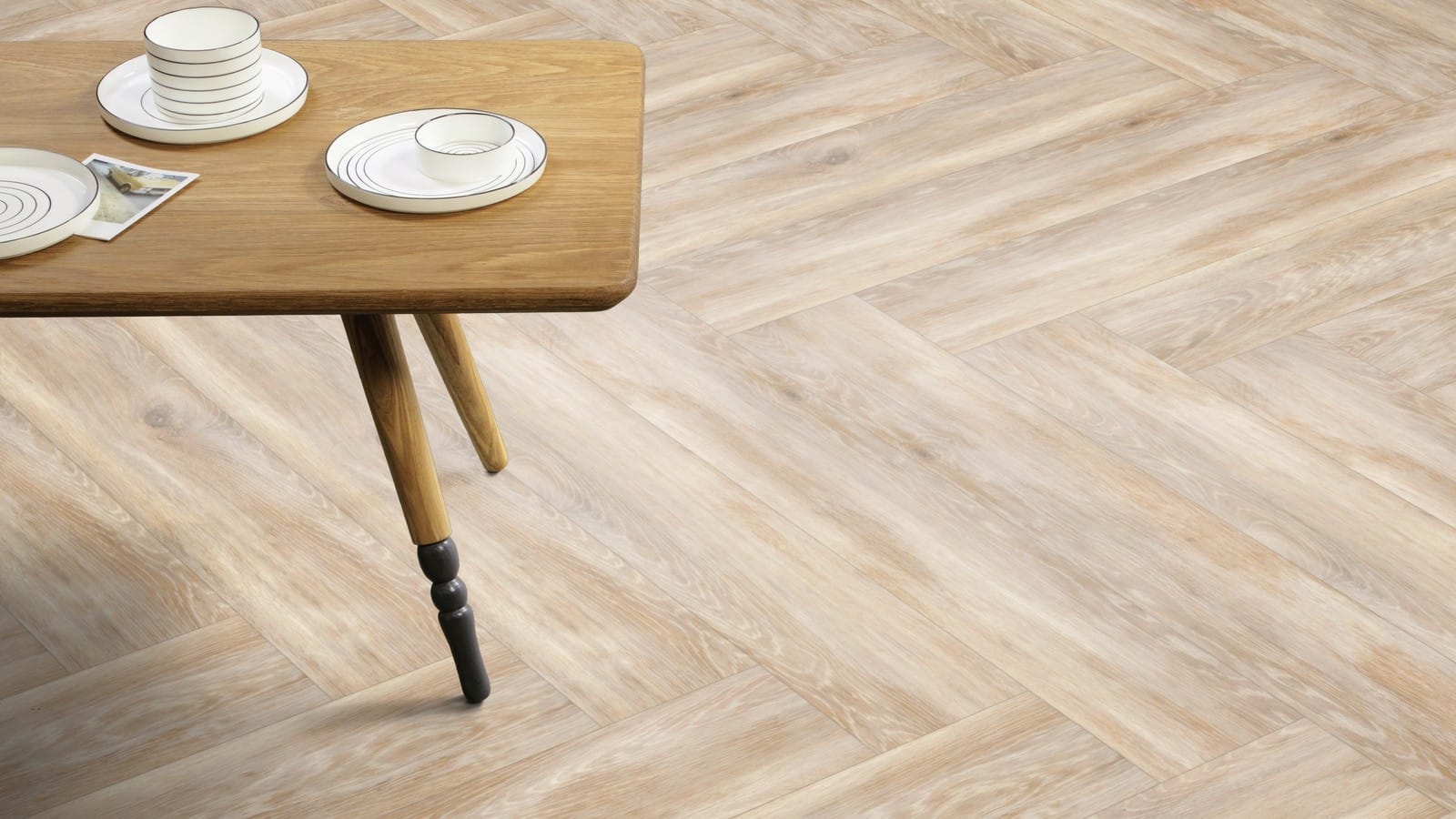 The Herringbone Plank design of Lime Washed Wood luxury vinyl tile by Amtico