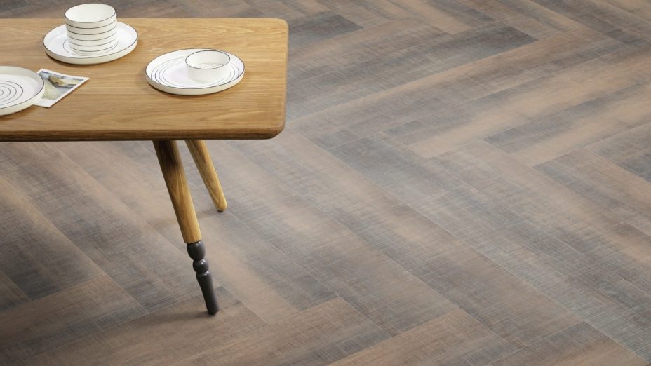 The Herringbone Plank design of Dockland Oak luxury vinyl tile by Amtico