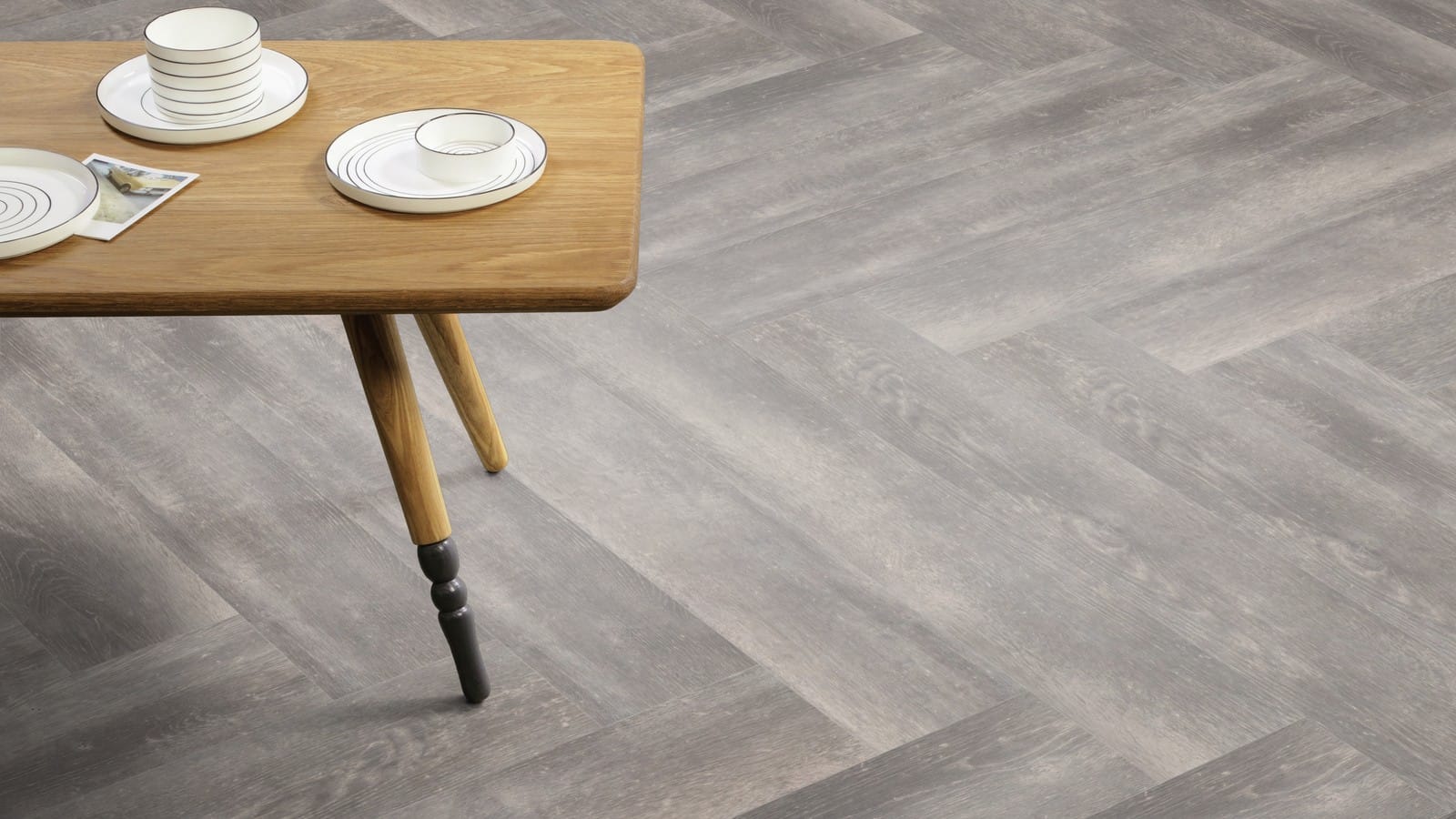 The Herringbone Plank design of Alpine Oak luxury vinyl tile by Amtico