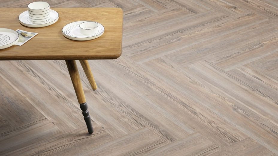 The Herringbone Plank design of Parisian Pine luxury vinyl tile by Amtico