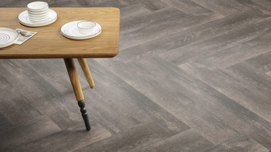 The Herringbone Plank design of Aspen Oak luxury vinyl tile by Amtico