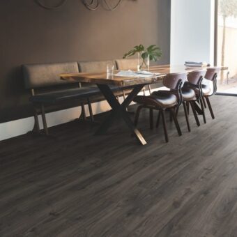 View of Newcastle Oak Dark EL3581 laminate tile by Quick-Step