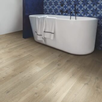 View of Soft Oak Light Brown IM3557 laminate tile by Quick-Step