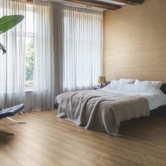 View of Scraped Oak Grey Brown IM1850 laminate tile by Quick-Step