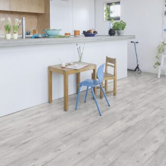 View of Concrete Wood Light Grey IM1861 laminate tile by Quick-Step