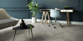 View of New England Oak - Misty Herringbone luxury vinyl tile by Invictus