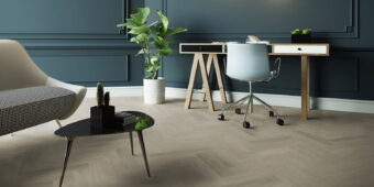 View of New England Oak - Sand Herringbone luxury vinyl tile by Invictus