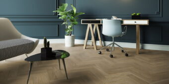 View of New England Oak - Toffee Herringbone luxury vinyl tile by Invictus