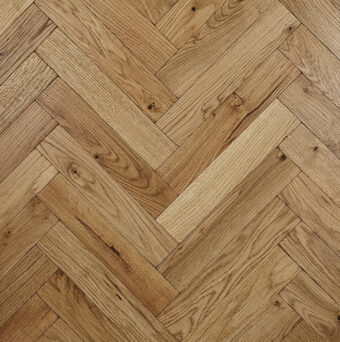 Solid oak herringbone wood flooring named Cathedral Honey