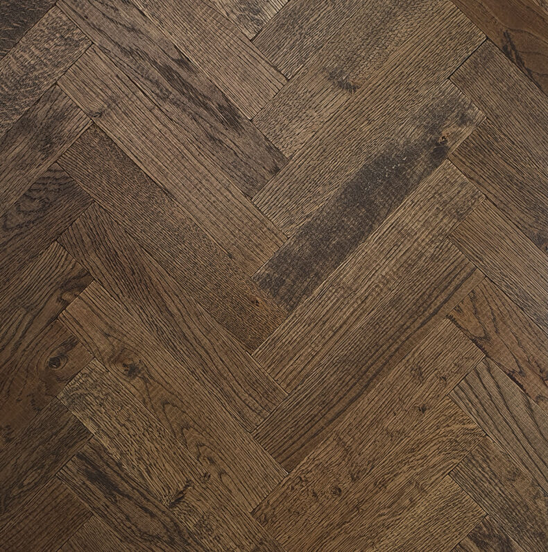 Solid oak herringbone wood flooring named Cathedral Tobacco