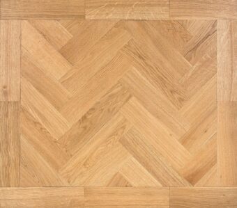 Solid oak parquet herringbone wood flooring with two block border finished with natural oil in Surrey