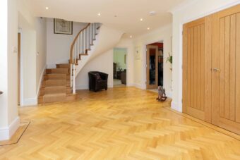 Solid oak parquet herringbone wood flooring with two block border finished with natural oil in Surrey