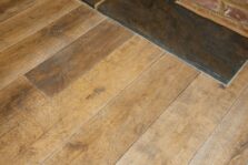 Distressed engineered oak wood flooring country grade 190mm wide with splits and character finished with natural oil in Surrey
