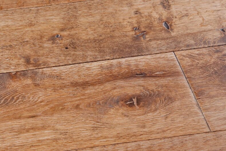 Distressed engineered oak wood flooring country grade 190mm wide with splits and character finished with natural oil in Surrey