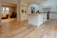 Distressed engineered oak wood flooring country grade 190mm wide with splits and character finished with natural oil in Surrey