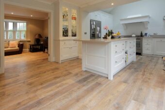 Distressed engineered oak wood flooring country grade 190mm wide with splits and character finished with natural oil in Surrey
