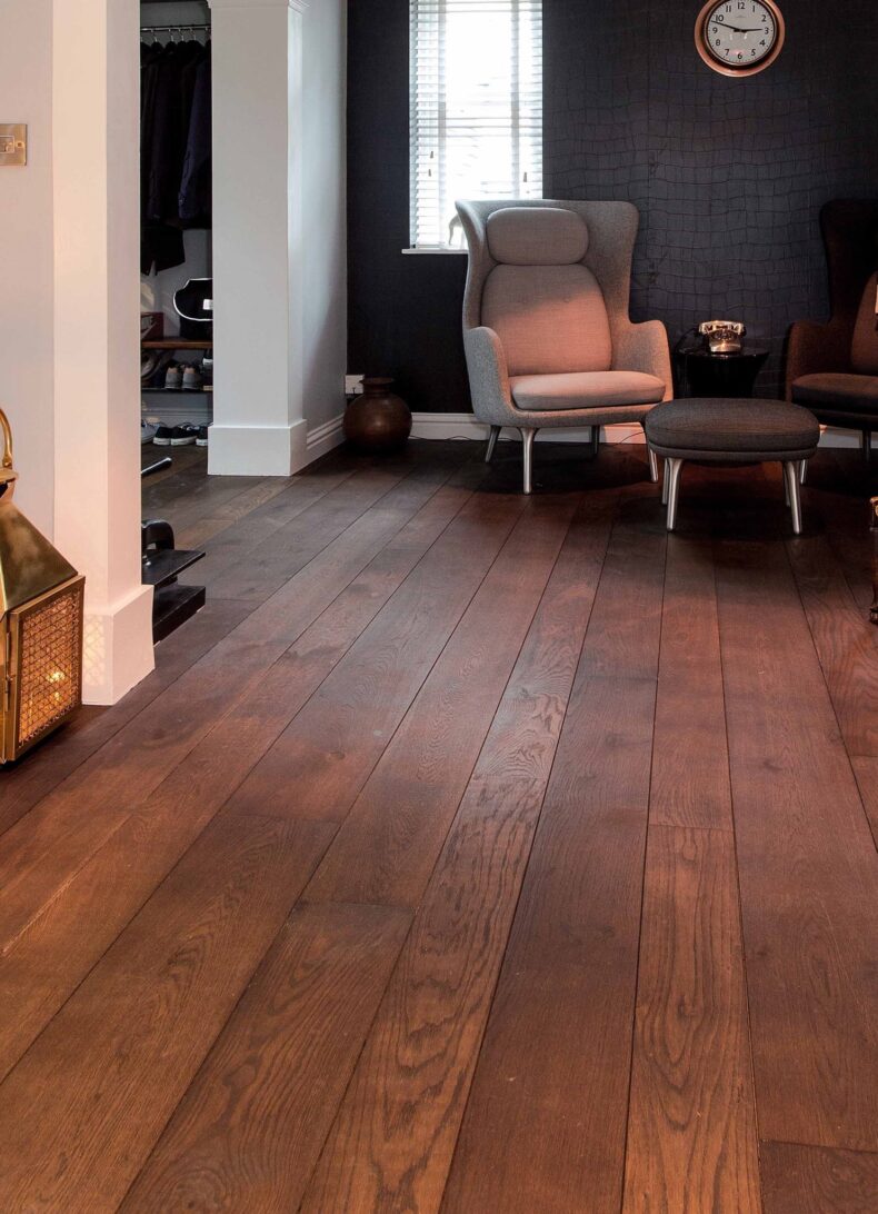 Dark brown engineered oak wood flooring classic grade in three widths 140mm 180mm 220mm wide fumed and finished with natural dark oil in Surrey