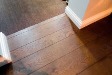 Dark brown engineered oak wood flooring classic grade in three widths 140mm 180mm 220mm wide fumed and finished with natural dark oil in Surrey