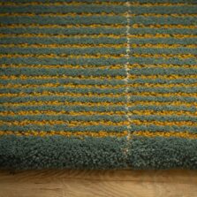 Overton Teal rug by Roger Oates