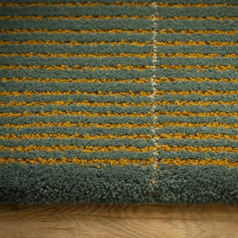 Overton Teal rug by Roger Oates